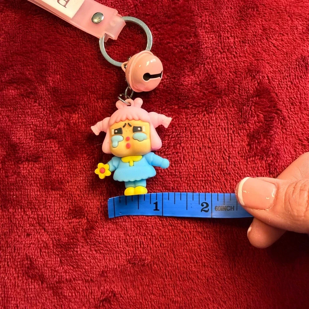 Crying Girl 3D PVC Keychain Pink Blue Character Charm with Bell and Boom Strap